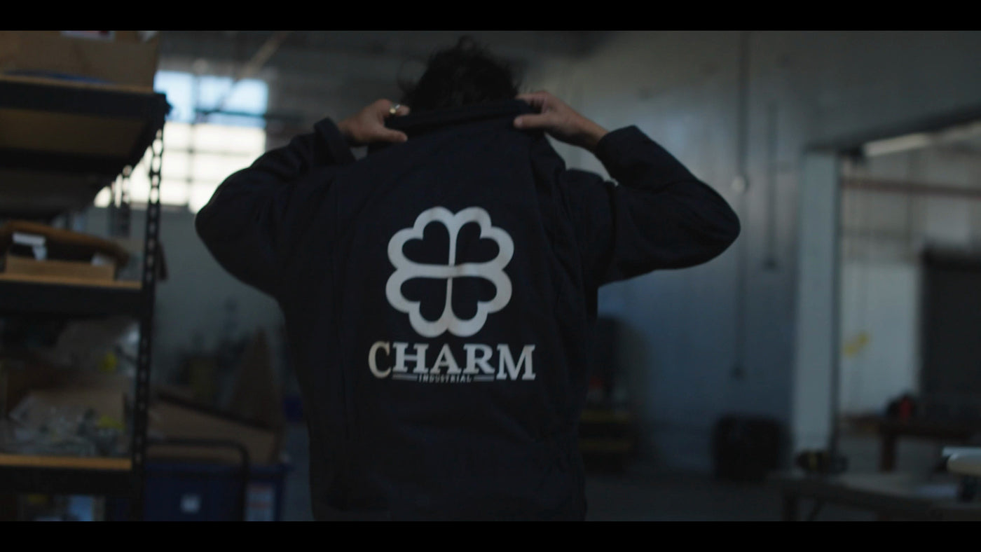 Charm field jacket with clover emblem