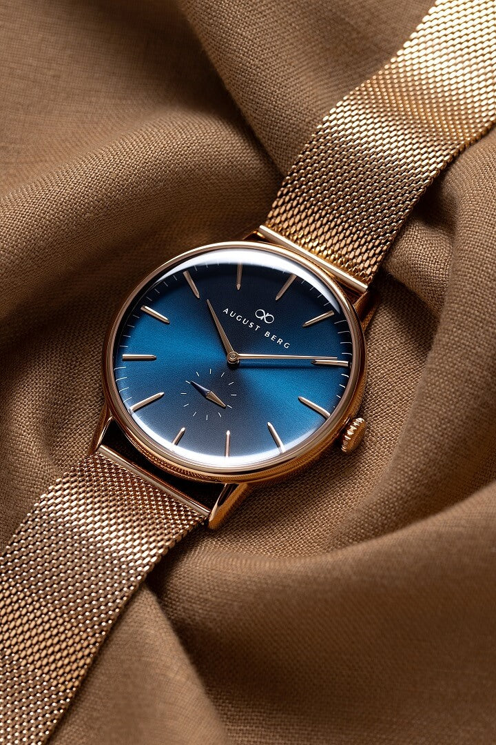 Rose gold watch with best sale blue dial